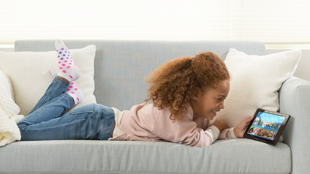 Child with Amazon Fire tablet